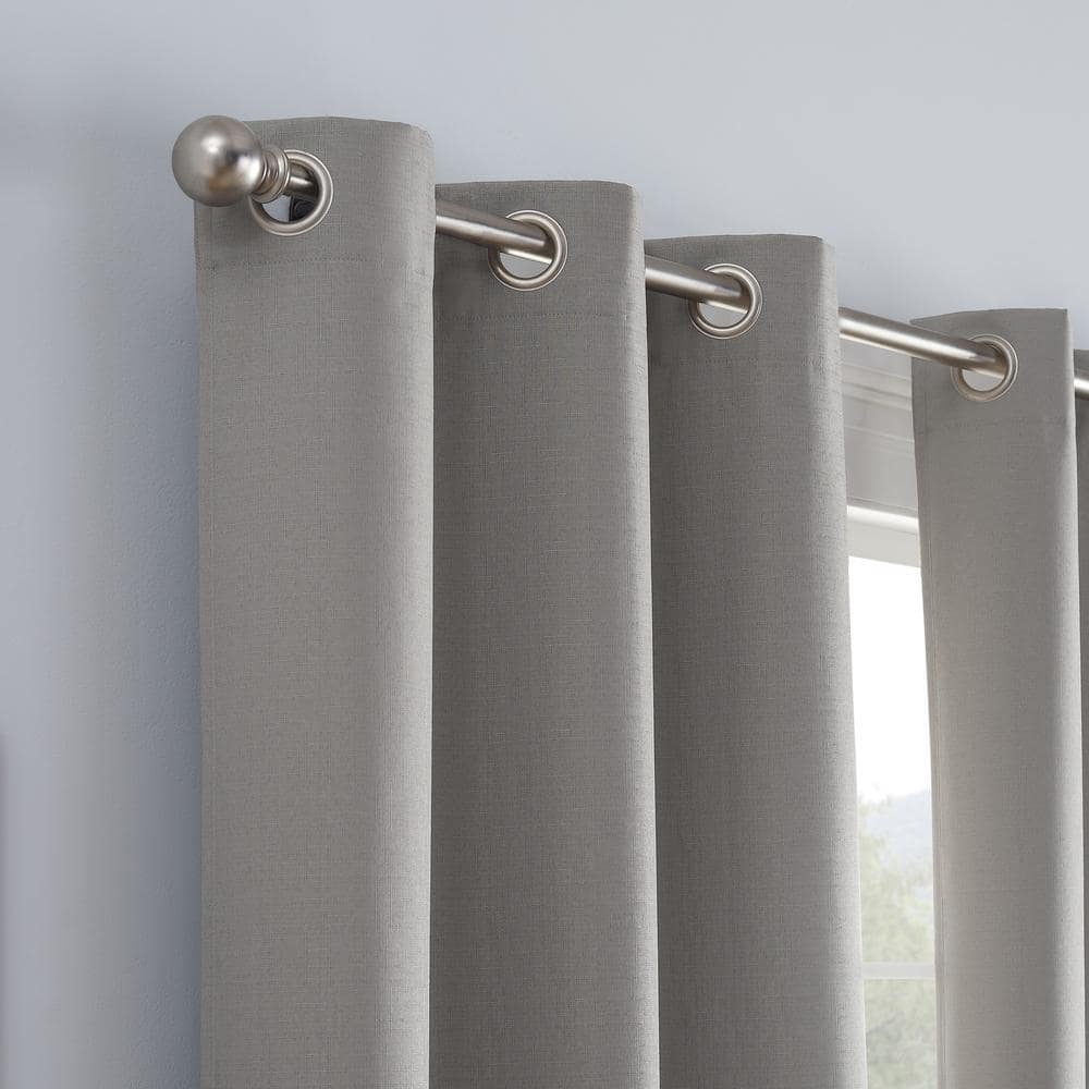 Kylie Thermaback Grey Solid Polyester 37 in. W x 95 in. L 100% Blackout Pair Grommet Top Curtain Panel