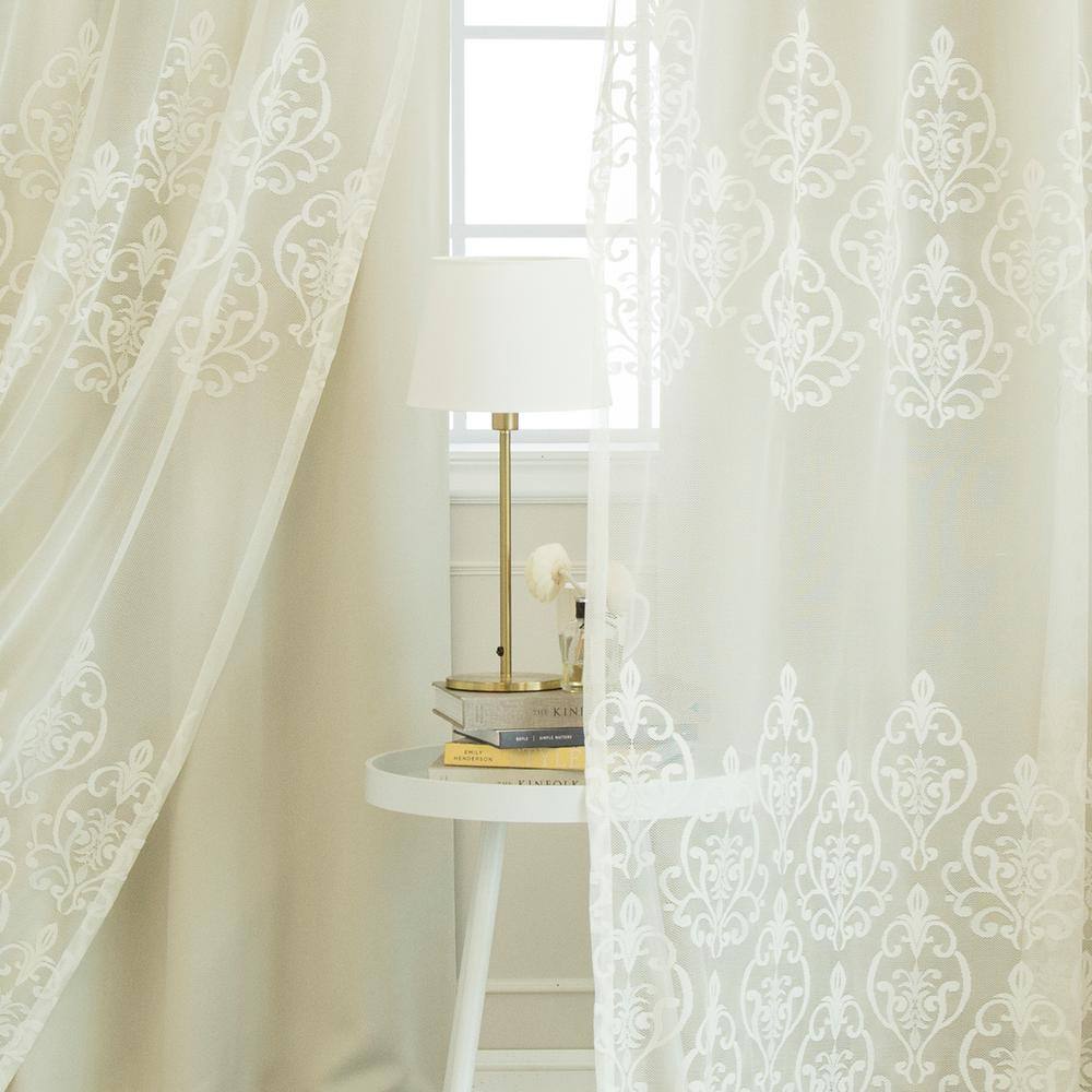 Ivory Solid Grommet Sheer Curtain – 52 in. W x 84 in. L (Set of 2)