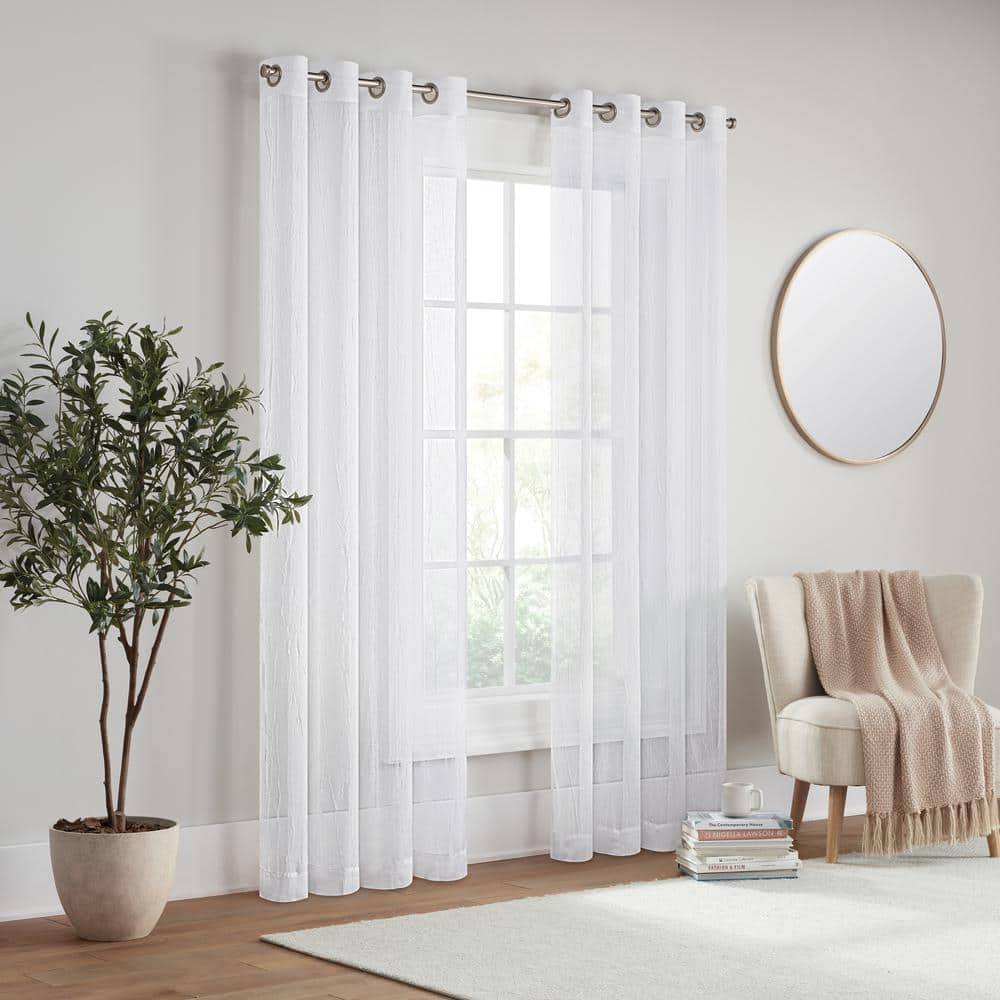 Emina White Solid Polyester 50 in. W x 84 in. L Sheer Grommet Curtain