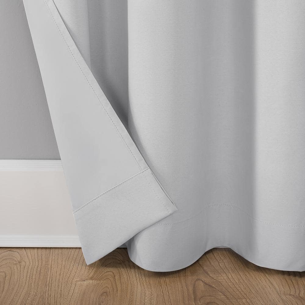 Cyrus White Polyester Solid 40 in. W x 84 in. L Noise Cancelling Grommet Blackout Curtain